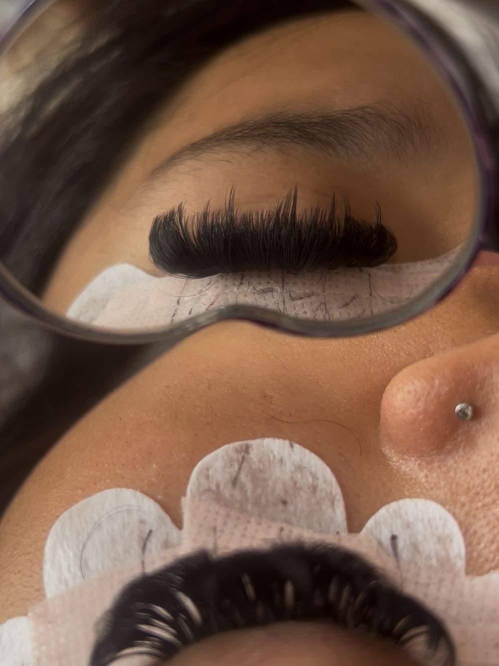 Fluffy lashes in a heart-shaped mirror